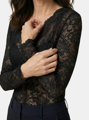 Blouse en dentelle florale coupe ajustée col V manches longues femme