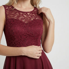Robe fluide asymétrique sans manches femme élégante soirée longueur midi