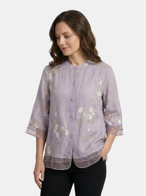 Blouse en coton légère broderies florales femme coupe ample estivale chic