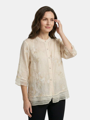 Blouse en coton légère broderies florales femme coupe ample estivale chic