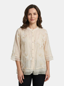 Blouse en coton légère broderies florales femme coupe ample estivale chic