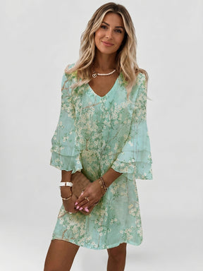 Mini robe imprimé marbre femme manches évasées col en V silhouette fluide