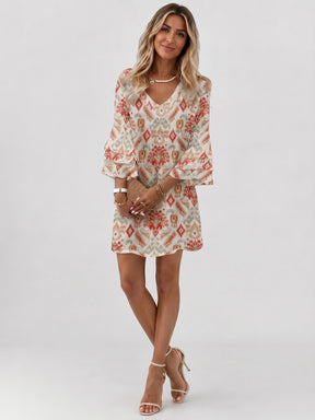Mini robe imprimé marbre femme manches évasées col en V silhouette fluide