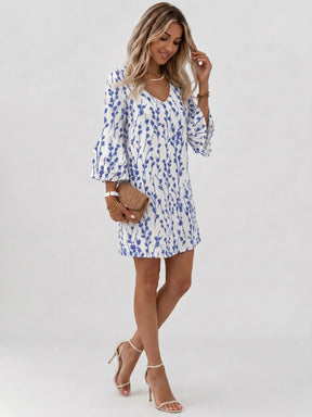 Mini robe imprimé marbre femme manches évasées col en V silhouette fluide