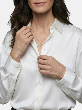 Blouse satinée coupe décontractée drapé fluide éclat subtil femme