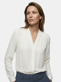 Blouse satinée manches bouffantes taille ajustée style estival femme