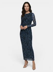 Robe léopard transparente ajustée manches longues sophistiquée femme élégante