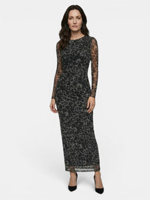 Robe léopard transparente ajustée manches longues sophistiquée femme élégante