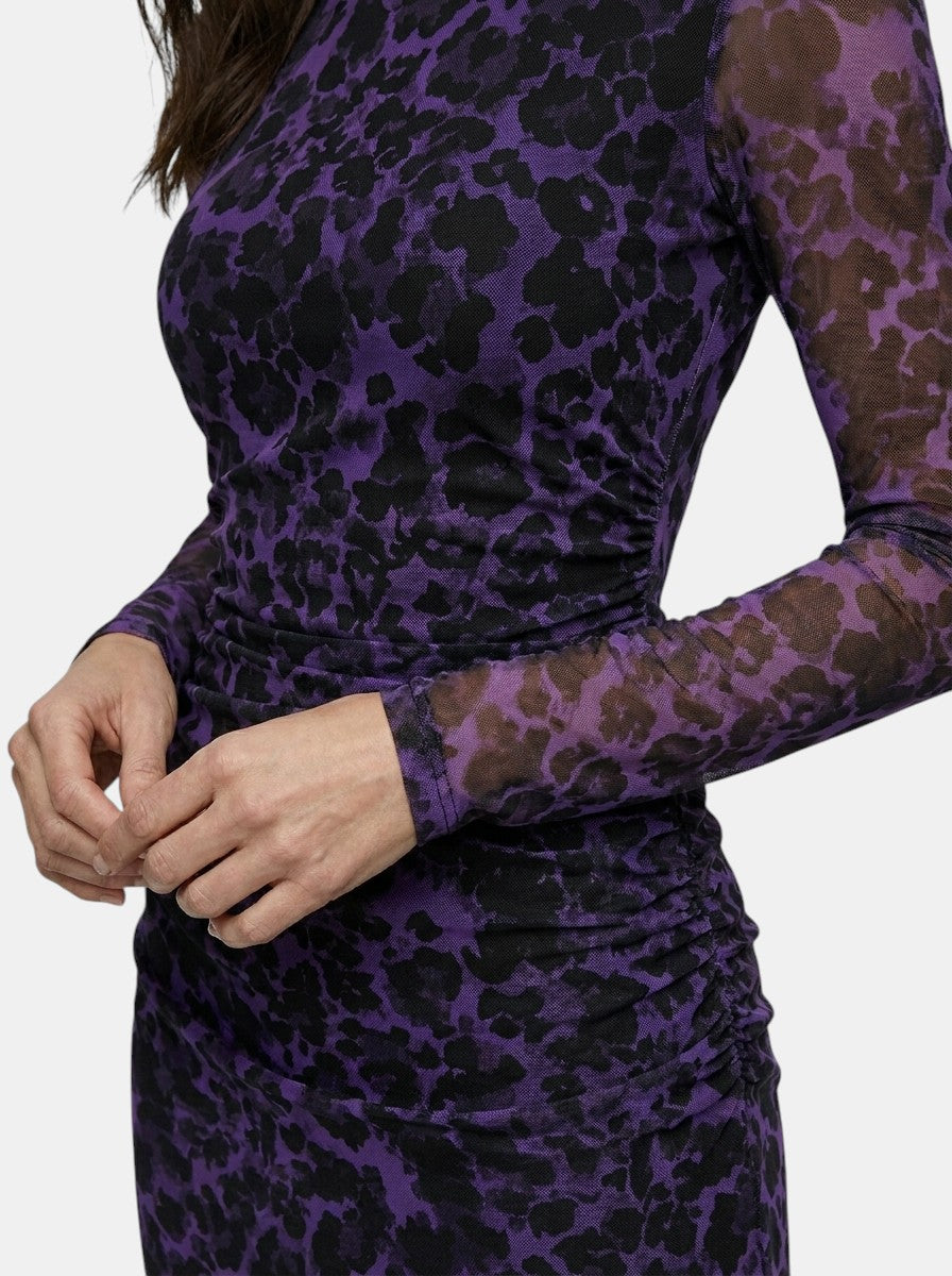 Robe léopard transparente ajustée manches longues sophistiquée femme élégante
